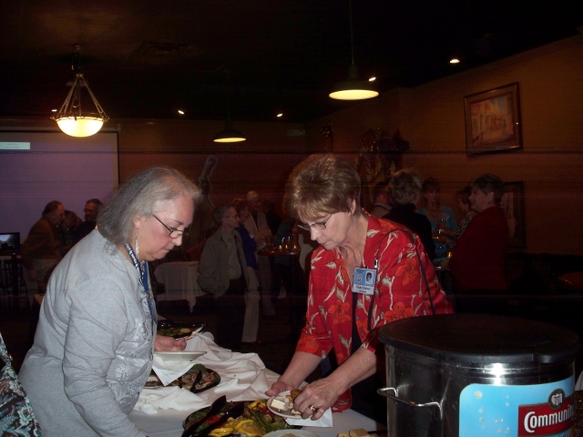 Kay Lynch Adams enjoying the wonderful buffet at Ralph and Kacoos on Friday night.  